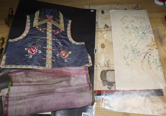 A Chinese embroidered silk waistcoat, a gilt thread panel of a dragon and sundries